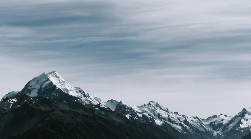 snow coated rocky mountains